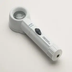 10.1X / 36.4D COIL Raylite 36 Xenon Electric Illuminated Magnifier - 1.25 Inch Lens