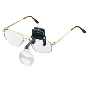 Eschenbach 4x clip-on spectacle magnifier attached to eyeglasses